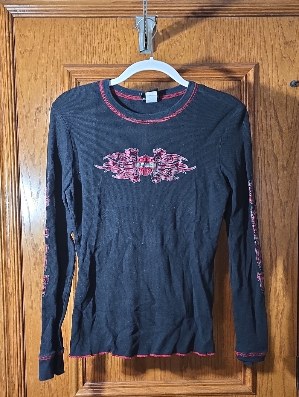 Black Long-Sleeve Graphic Tee with Red Accents